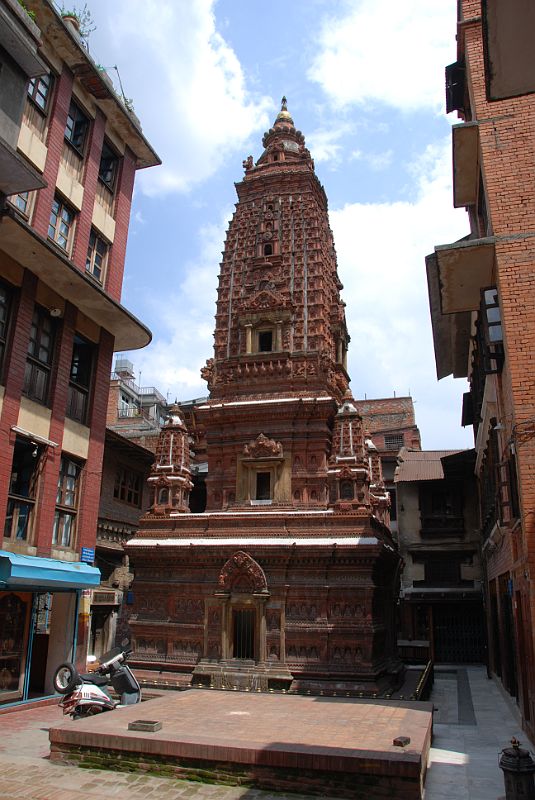 Kathmandu Patan 06 Mahabouddha Temple 01 The shikhara-style Mahabouddha Temple (Temple of a Thousand Buddhas) southeast of Patan�s Durbar Square gets its name from the terracotta tiles, each with an image of the Buddha. It resembles the Mahabodhi Temple at Bodh Gaya in India where Shakyamuni gained enlightenment. This temple was originally built in 1585, but was rebuilt after being destroyed in the 1934 earthquake.